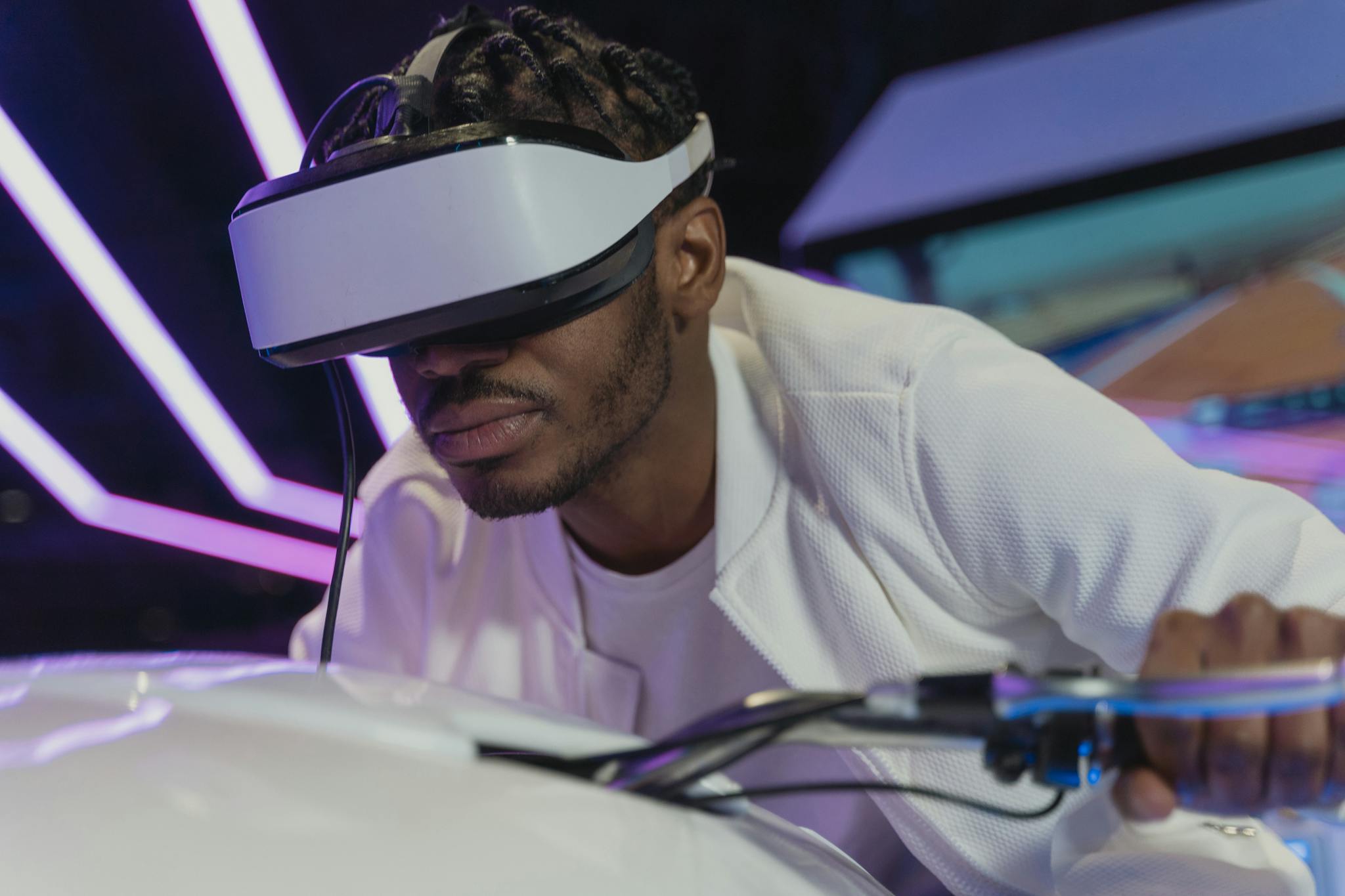 A man deeply engaged in virtual reality gaming with a VR headset, creating a futuristic and immersive experience.